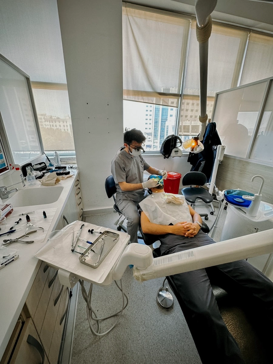 Dentist Providing Care to Patient